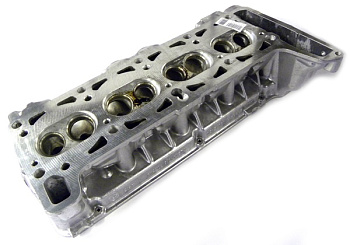 Головка блока ВАЗ-21214 голая инж. без шпилек (под большие г/компенсаторы) (АвтоВАЗ) н/о