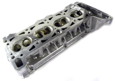 Головка блока ВАЗ-21214 голая инж. без шпилек (под большие г/компенсаторы) (АвтоВАЗ) н/о